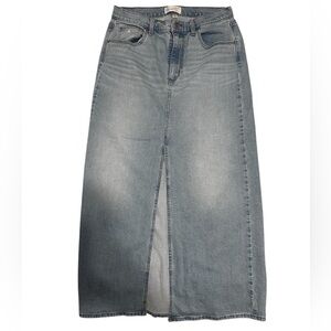 Women’s blue jeans skirt with a front split in a size 10. Front & back pocket’s